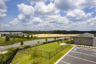 The Pointe at Siena Ridge 55+ Active Adult Apartment Homes in Davenport, FL - Foto de edificio - Building Photo