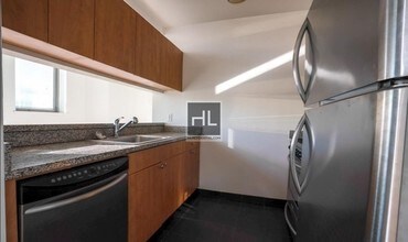448 W 37th St-Unit -301 in New York, NY - Building Photo - Building Photo