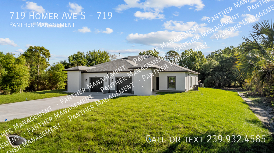 719 Homer Ave S-Unit -719 in Lehigh Acres, FL - Building Photo