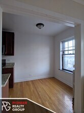 2122 W Ainslie St, Unit 2100-2E in Chicago, IL - Building Photo - Building Photo