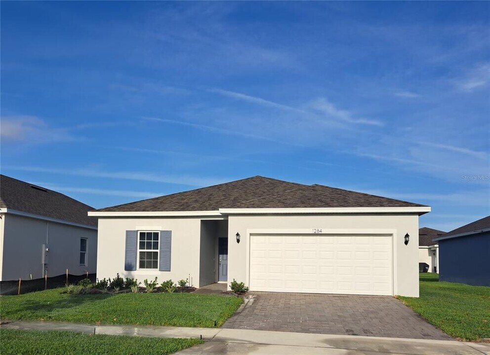 1284 Tupelo Trl in Haines City, FL - Foto de edificio