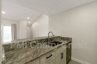 7905 E Colorado Ave in Denver, CO - Building Photo - Building Photo