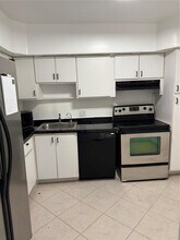 2651 S Course Dr, Unit 106 in Pompano Beach, FL - Building Photo - Building Photo