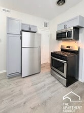 4854 W Diversey Ave, Unit 1F in Chicago, IL - Foto de edificio - Building Photo