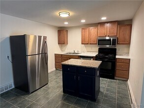 8587 Caughdenoy Rd in Clay, NY - Building Photo - Building Photo