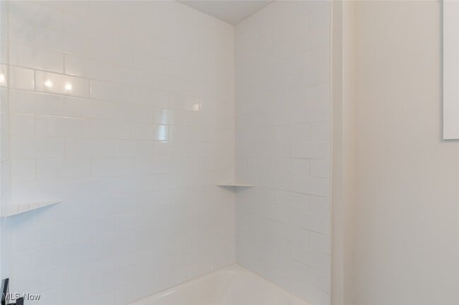 property at 1464 E 123rd St