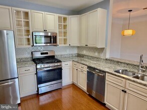 6553 Grange Ln-Unit -203 in Alexandria, VA - Building Photo - Building Photo