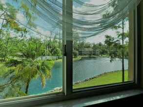 5780 Woodmere Lake Cir in Naples, FL - Building Photo - Building Photo