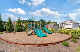 7725 Farrow Pass Cir in Cumming, GA - Building Photo - Building Photo