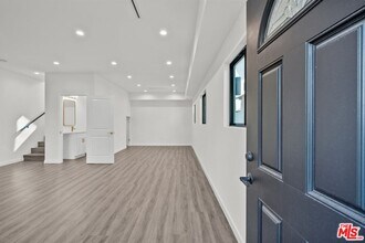 6245 McLaren Ave in Los Angeles, CA - Building Photo - Building Photo