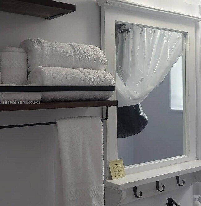 property at 3710 Collins Ave