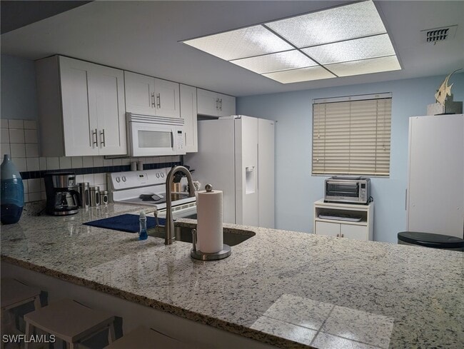 property at 16100 Bay Pointe Blvd