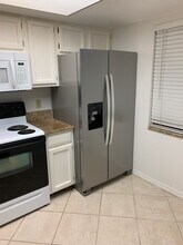 5825 Rattlesnake Hammock Rd, Unit 107 in Naples, FL - Building Photo - Building Photo