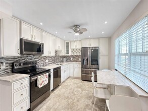 3505 Oaks Way, Unit 310 in Pompano Beach, FL - Building Photo - Building Photo