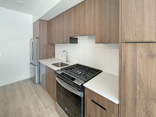 UXBorough Living in Calgary, AB - Building Photo - Building Photo