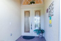 5725 Lago Villaggio Way, Unit 2107 in Naples, FL - Building Photo - Building Photo