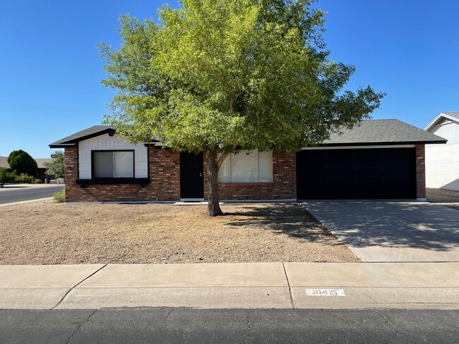property at 10421 W Puget Ave