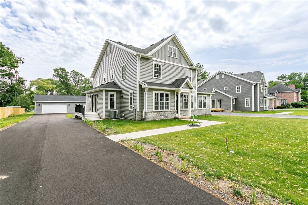 16 Cottage St in Spencerport, NY - Building Photo