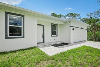 11992 Atoll Ave in Port Charlotte, FL - Building Photo - Building Photo