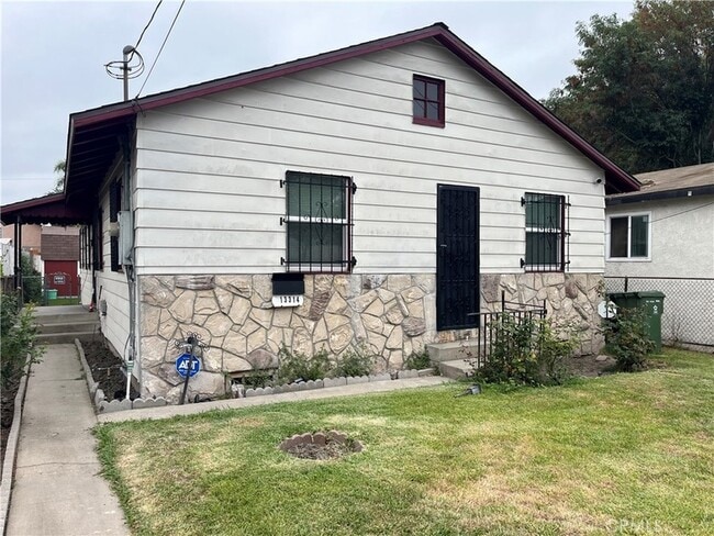 property at 13314 S Oleander Ave