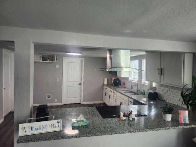 property at 714 E Lamar St