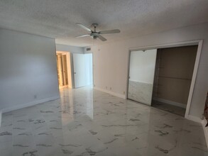 3051 N Course Dr, Unit 404 in Pompano Beach, FL - Building Photo - Building Photo