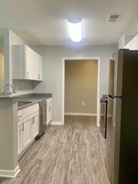 Charleston Place Apartment Homes in Jacksonville, NC - Building Photo - Building Photo