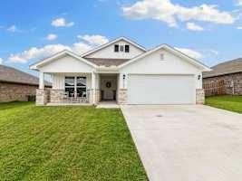 property at 6102 NW Hoover St