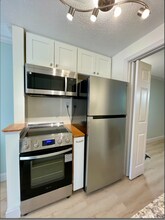 93 Henry Law Ave, Unit Cricket Brook in Dover, NH - Building Photo - Building Photo