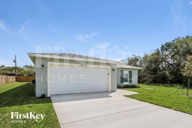 2661 SW Eastman St in Port St. Lucie, FL - Building Photo - Building Photo
