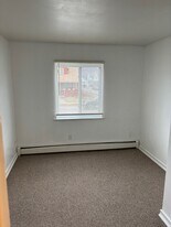 121 W William St, Unit 302 in Corning, NY - Building Photo