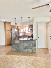 5773 Gatlin Ave in Orlando, FL - Building Photo - Building Photo
