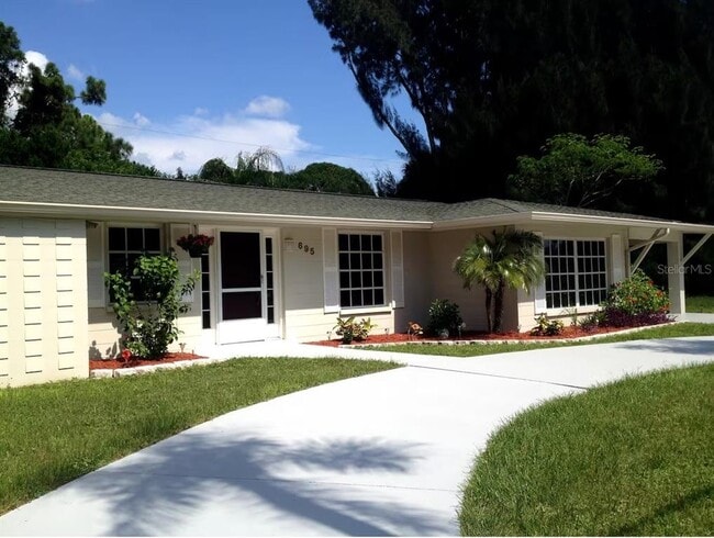 property at 695 Alligator Dr