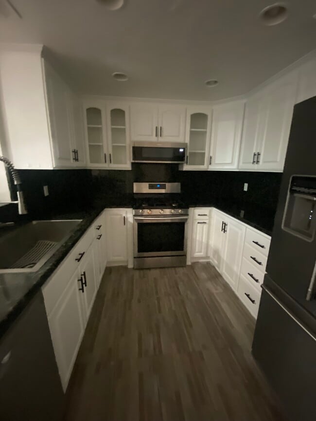 property at 9601 Woodman Ave