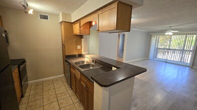 2500 Winding Creek Blvd, Unit #F206 in Clearwater, FL - Building Photo - Building Photo