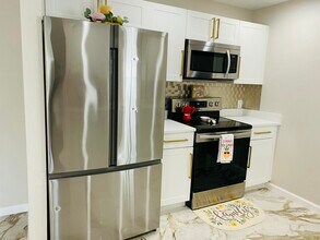 3119 Tropical Trail in Atlantis, FL - Building Photo - Building Photo