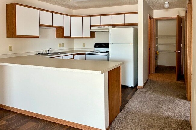 Pheasant Hollow Apartments in Grundy Center, IA - Building Photo - Building Photo