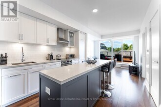 25 Malcolm Rd in Toronto, ON - Building Photo - Building Photo