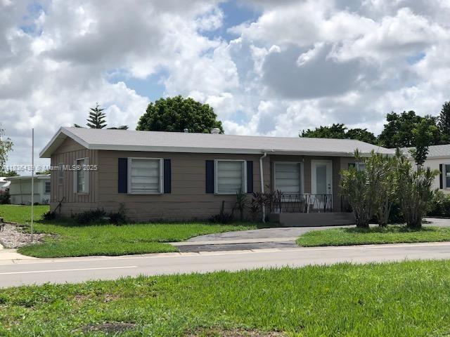 property at 6520 Sandalfoot Blvd