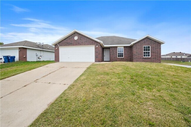 property at 6400 SW Meadow Well Ave