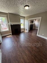 311-313 W Burgess St in Pittsburgh, PA - Building Photo - Building Photo
