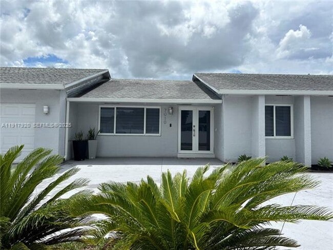 7010 SW 144th Pl in Miami, FL - Building Photo - Building Photo