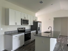 1121 NW 13th Terrace in Cape Coral, FL - Building Photo - Building Photo