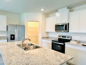 1256 Dugan CIR SE in Palm Bay, FL - Building Photo - Building Photo