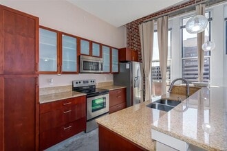 1136 Washington Ave, Unit 407 in St. Louis, MO - Foto de edificio - Building Photo