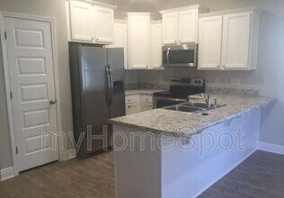 6091 ROYAL PORT Ct in Pensacola, FL - Building Photo - Building Photo