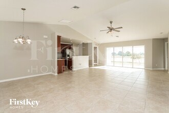 1121 NW Juanita Pl in Cape Coral, FL - Building Photo - Building Photo