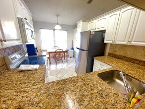 4698 Lucerne Lakes Blvd E, Unit 203 in Greenacres, FL - Building Photo - Building Photo