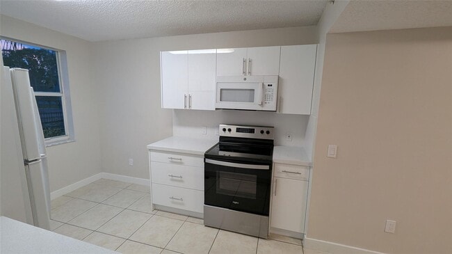 property at 9640 NW 2nd St