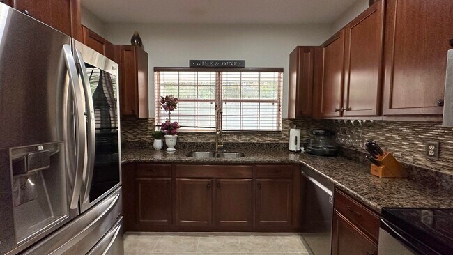 4702 Cohune Palm Ct in Greenacres, FL - Foto de edificio - Building Photo